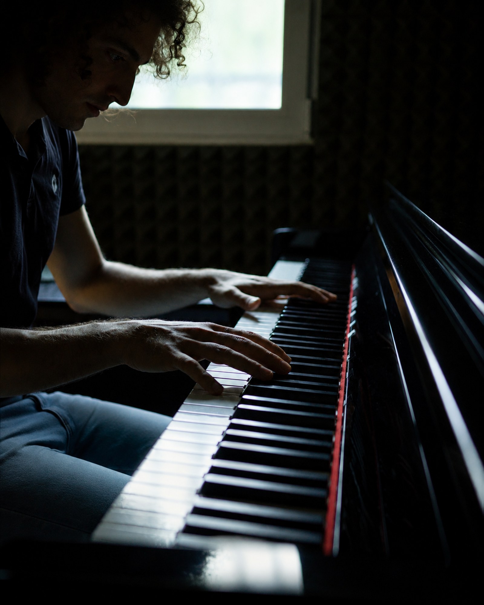 Mattia Leonardi composing at the piano